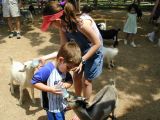 KK and Ethan feeding baby goatsFri Jun 3 11:05:48 CDT 2005