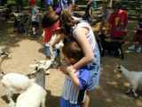 KK and Ethan feeding baby goatsFri Jun 3 11:06:02 CDT 2005