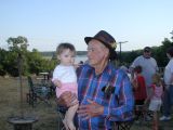 Grandpa Sid holding JessicaSun Jul 3 17:45:48 CDT 2005