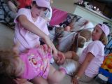 KK tickling Aubrey with Brooke watchingWed Aug 10 10:49:00 CDT 2005