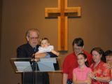 Pastor Denbow dedicating Jessica, Tim, Kirstin, and CindySun Aug 28 10:21:26 CDT 2005